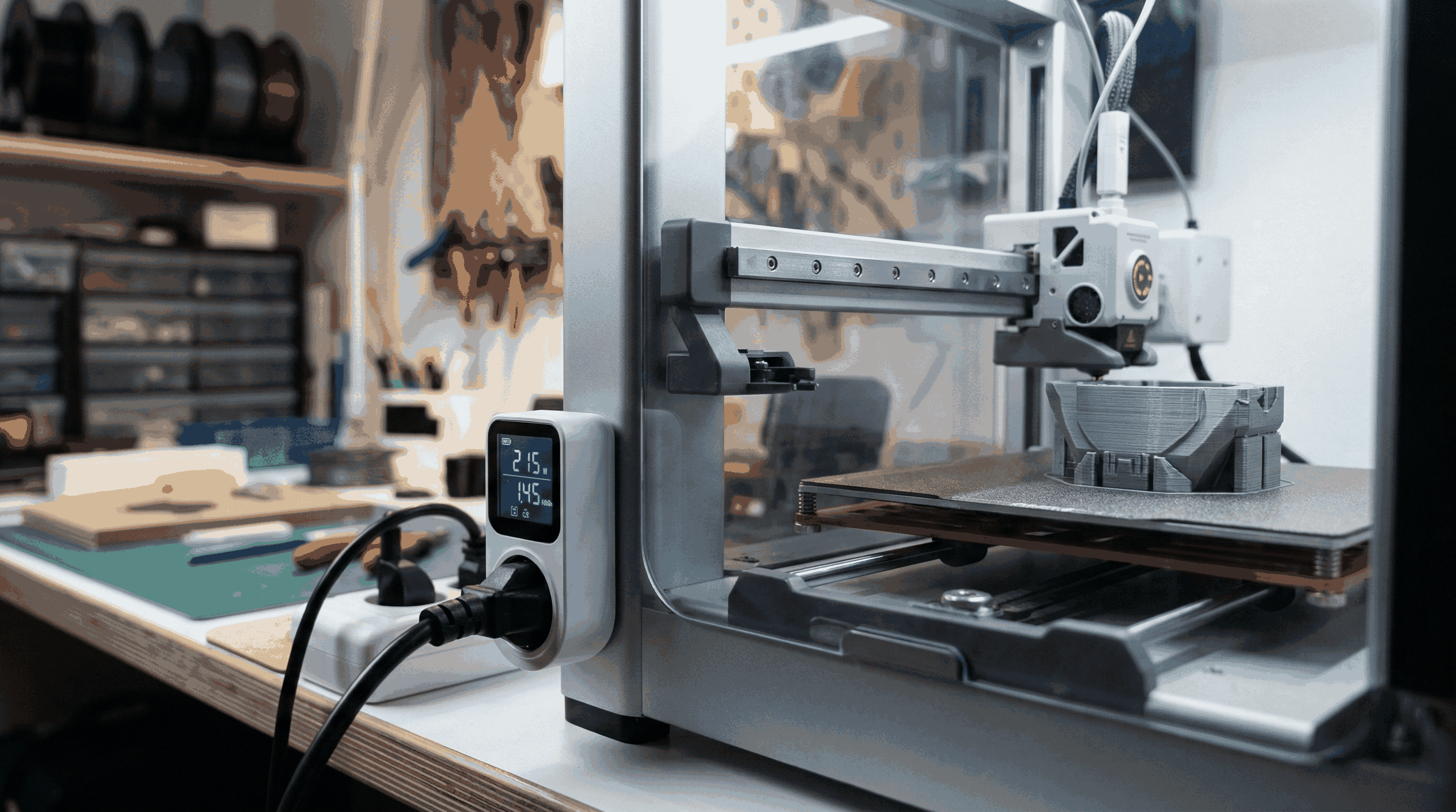 FDM 3D printer connected to smart plug showing live wattage and total kilowatt hours