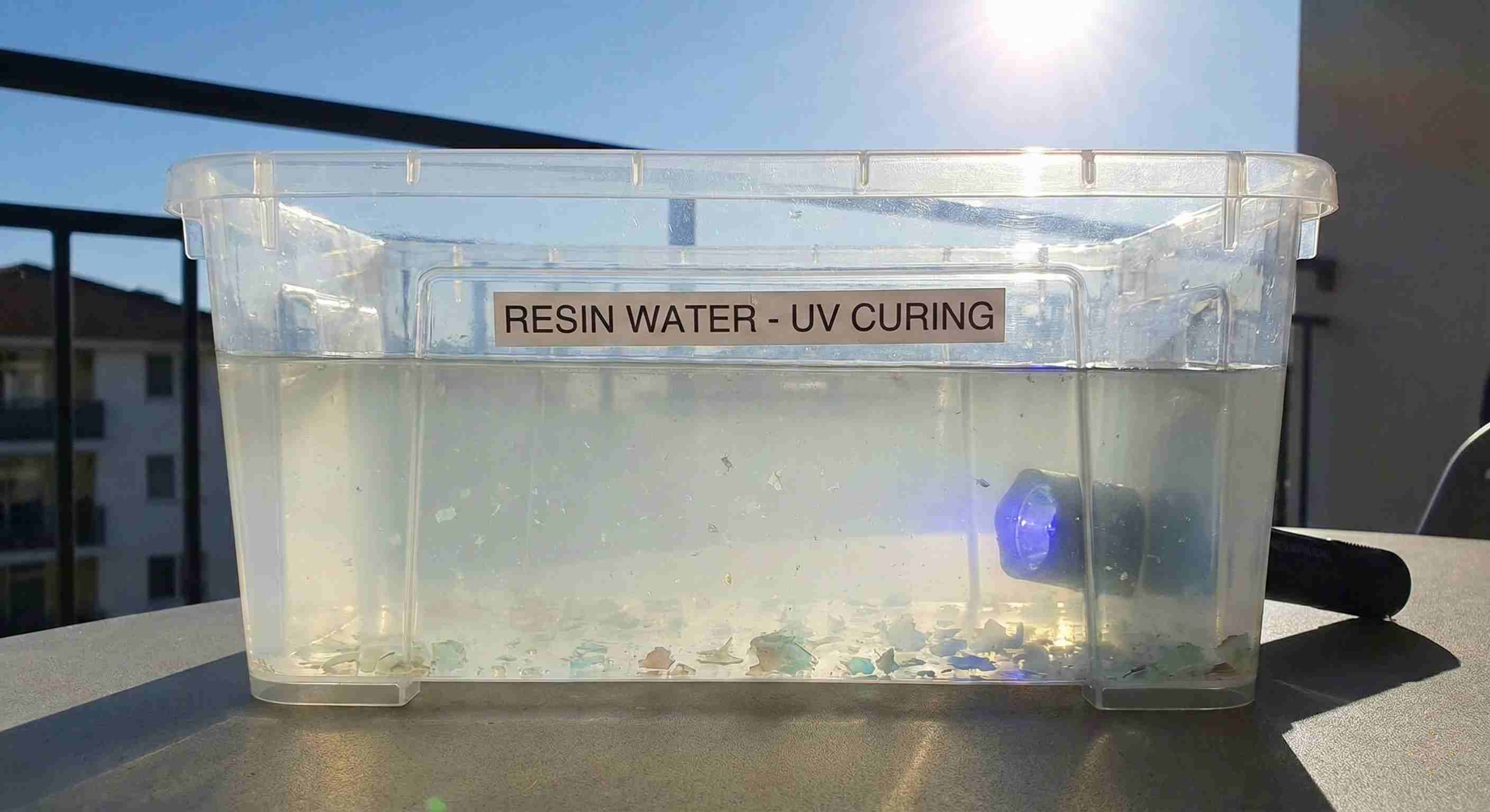 Safe disposal of resin contaminated water in sunlight